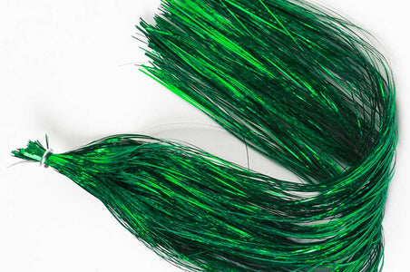 Du tilføjede <b><u>Holographic Flashabou - Green (thin)</u></b> til kurven.